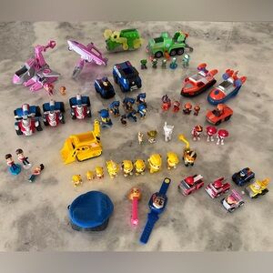 Huge lot of Paw Patrol Colorful Action Figures and Vehicles Set